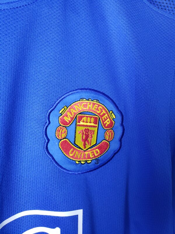 camiseta manchester united azul 2008 escudo