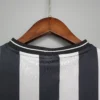 Camiseta Newcastle United 97-99 primera equipacion cuello anterior