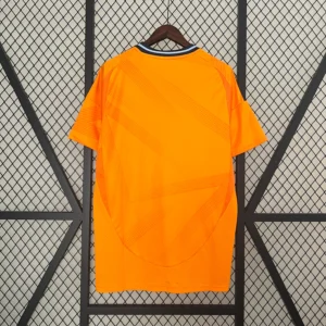 Camiseta Real Madrid naranja 2024 dorsal