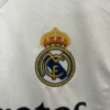 Conjunto Real Madrid niño 2024-2025 Mbappé escudo-1