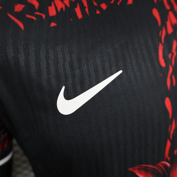 Camiseta FC Barcelona León Rojo 2024-2025 logo