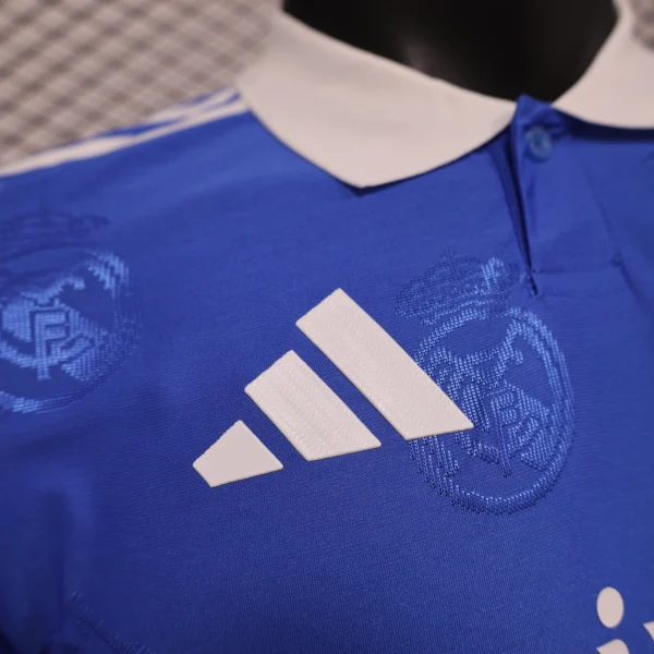 Camiseta Real Madrid 2025-2026 Azul logo