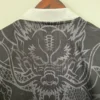 Camiseta Real Madrid negro 2023-2024 Dragon cuello anterior