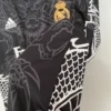 Camiseta Real Madrid negro 2023-2024 Dragon lateral