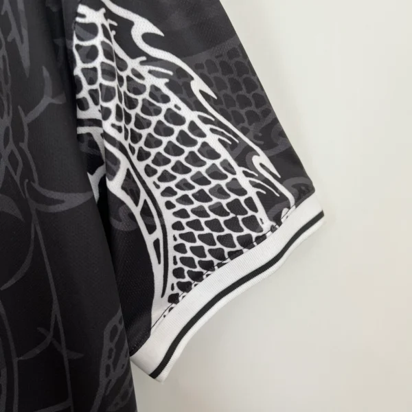 Camiseta Real Madrid negro 2023-2024 Dragon manga