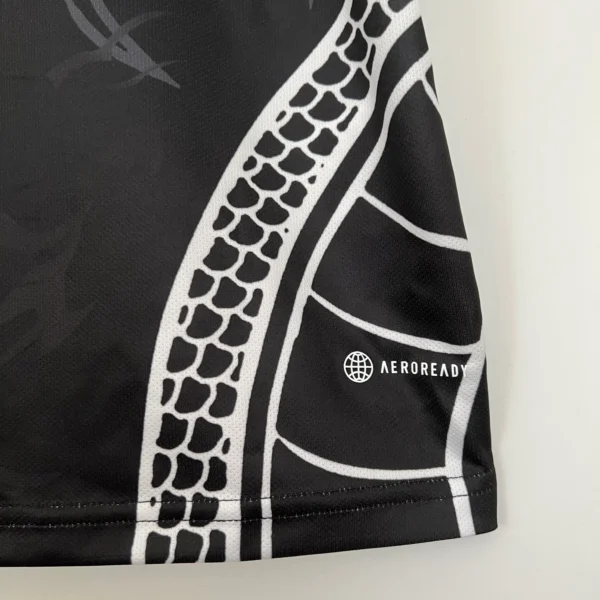 Camiseta Real Madrid negro 2023-2024 Dragon material