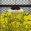 Camiseta amarillo Real Madrid 2025-2026 Dragon cuello anterior