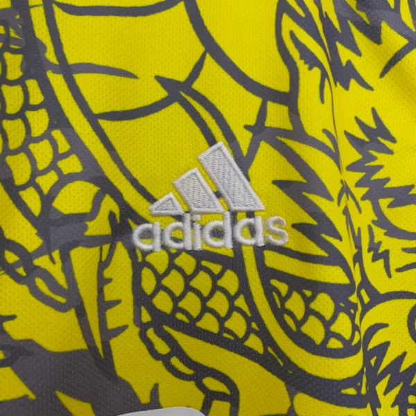 Camiseta amarillo Real Madrid 2025-2026 Dragon logo