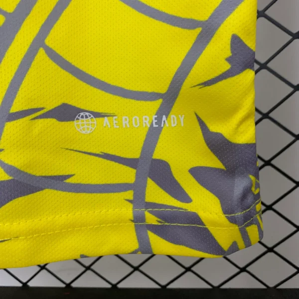 Camiseta amarillo Real Madrid 2025-2026 Dragon material