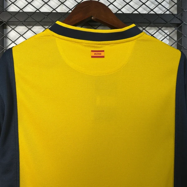 Camiseta retro Atletico Madrid amarillo 2013-2014 cuello anterior