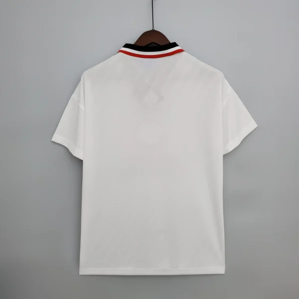 Camiseta retro Manchester United 1996-1997 blanca dorsal