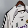Camiseta retro Real Madrid 2006-2007 Benq hombro