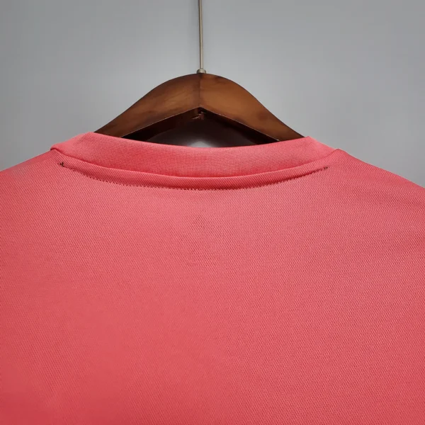 Camiseta retro Real Madrid 2020-2021 Rosa cuello anterior
