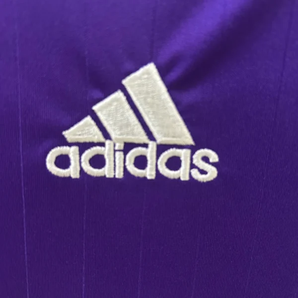 Camiseta retro Real Madrid morado 2006-2007 logo