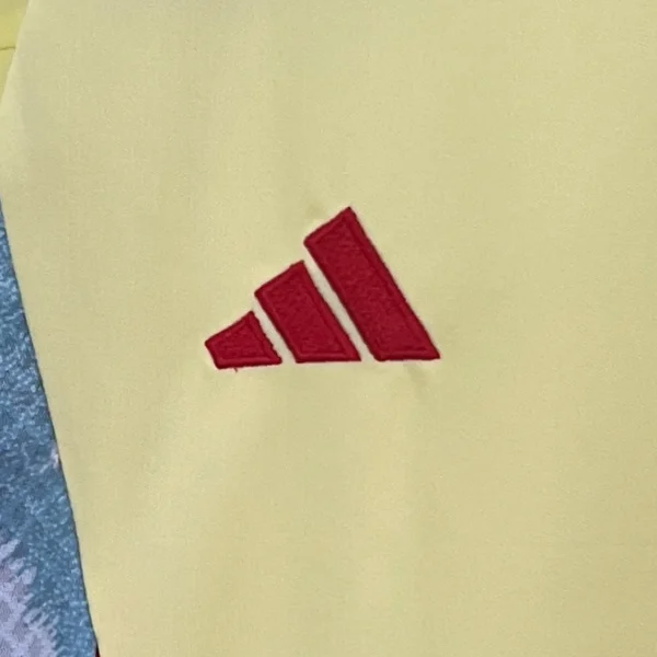 Conjunto España niño 2024 amarillo logo