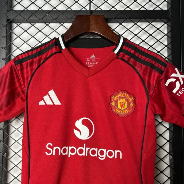 Nuevo Conjunto niño Manchester United 2025-2026 cuelo