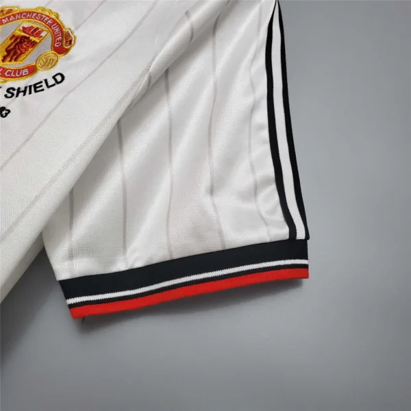 Camiseta blanca Manchester United 1982-1983 manga