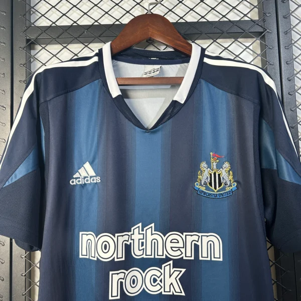 Camiseta retro Newcastle United 2005-2006 Azul cuello