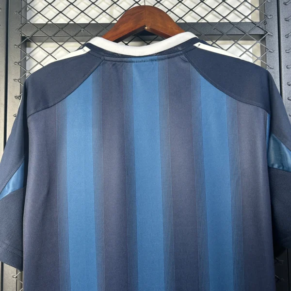 Camiseta retro Newcastle United 2005-2006 Azul cuello anterior