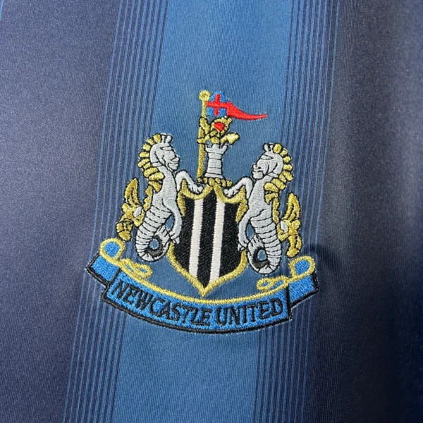 Camiseta retro Newcastle United 2005-2006 Azul escudo