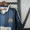 Camiseta retro Newcastle United 2005-2006 Azul manga