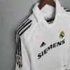 Camiseta retro Real Madrid Raúl 2005-2006 blanco hombro