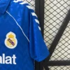 Camiseta retro Real Madrid azul 1986-1988 hombro