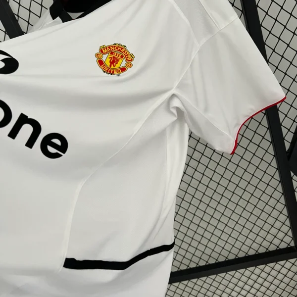 Camiseta retro blanca Manchester United 2002-2003 lateral