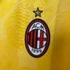 Camiseta AC Milan amarilla 2025-2026 escudo