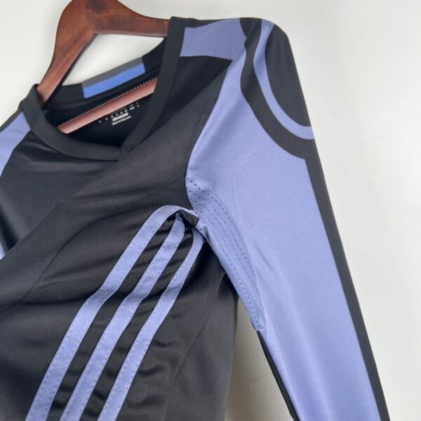 Camiseta negra Real Madrid 2016-2017 manga larga lateral