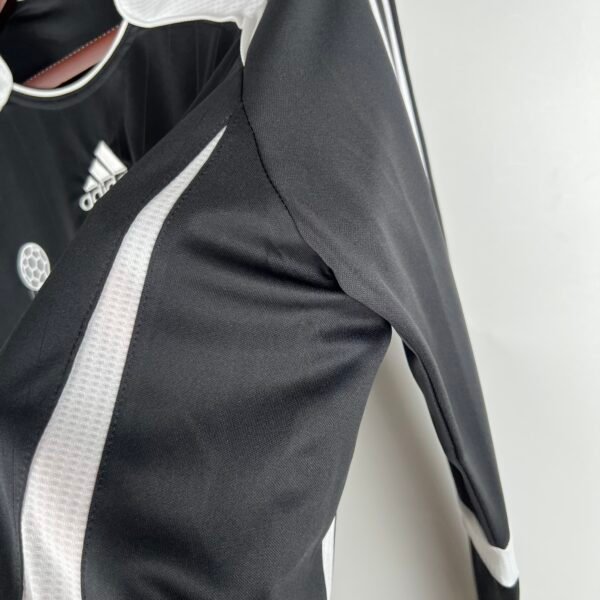 Camiseta retro Real Madrid negra 2006-2007 manga larga lateral