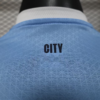 Camiseta manga larga Manchester City 2025-2026 cuello anterior