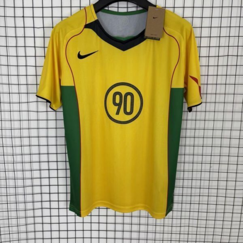 Camiseta Total 90 amarilla 2025-2026