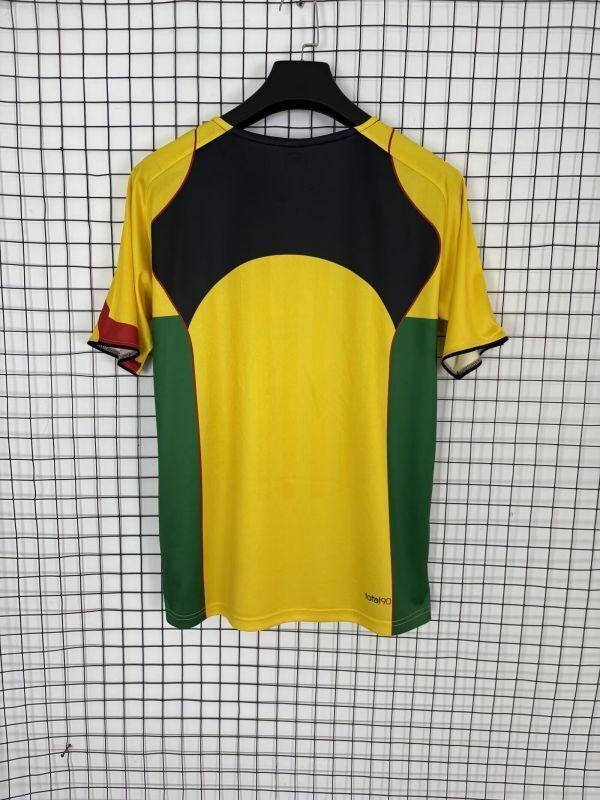 Camiseta Total 90 amarilla 2025-2026 dorsal