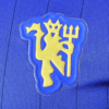 Camiseta morada Manchester United 2025-2026 escudo