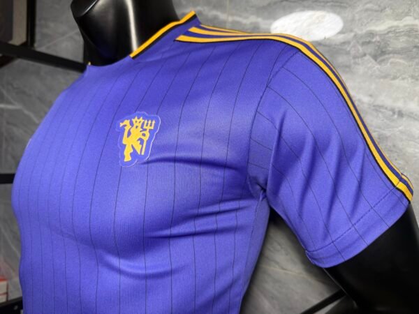 Camiseta morada Manchester United 2025-2026 manga