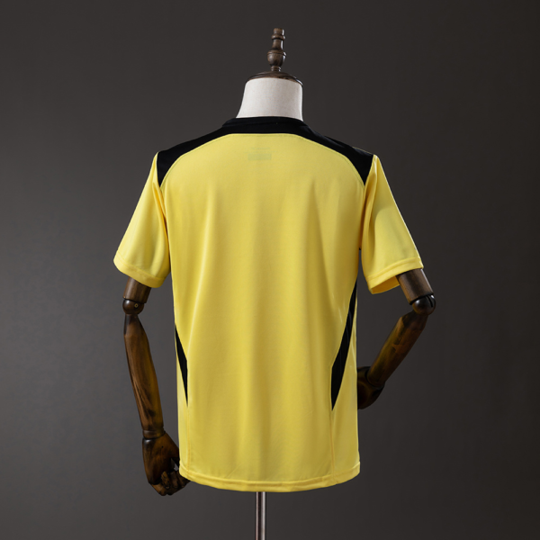 Camiseta retro Liverpool amarilla 2004-2005 dorsal