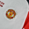Camiseta retro blanca Manchester United 2010-2011 escudo
