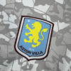 Camiseta gris Aston Villa 2025-2026 escudo