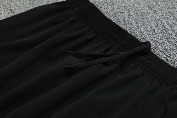 Conjunto Chandal niño-adulto Morado Manchester United 2025-2026 cintura