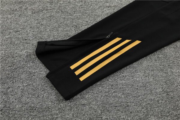 Conjunto chandal niño-adulto Negro Real Madrid 2024-2025 pies