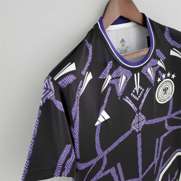 Camiseta Alemania Black Panther 2022 hombro