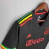 Camiseta Retro Ajax Negro 2022-2023 Marley hombro
