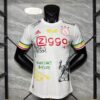 Camiseta Ajax Bob Marley 2025-2026 blanca