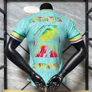 Camiseta Ajax Bob Marley 2025-2026 verde dorsal