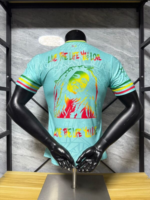 Camiseta Ajax Bob Marley 2025-2026 verde dorsal